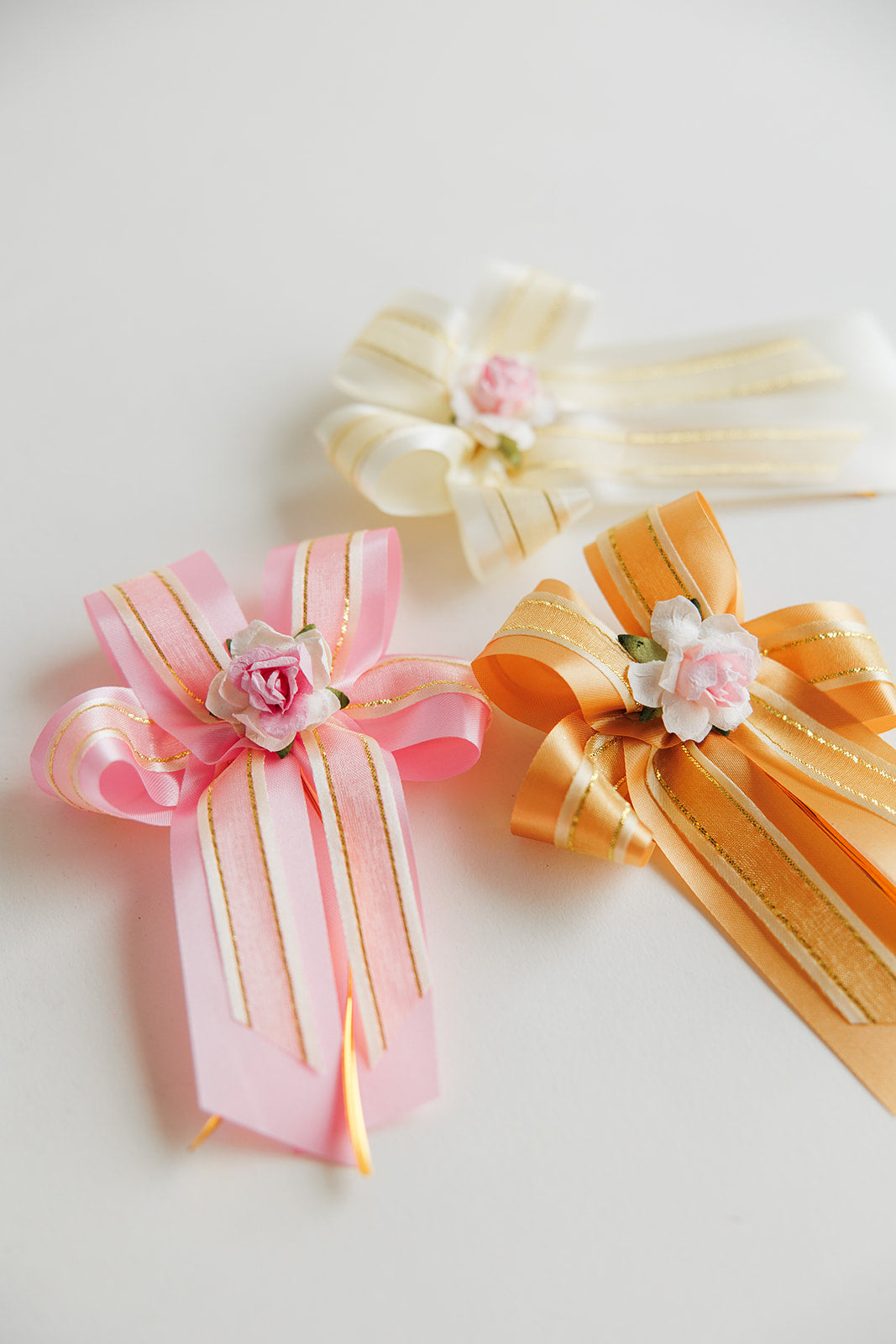 gold and pink gift bow