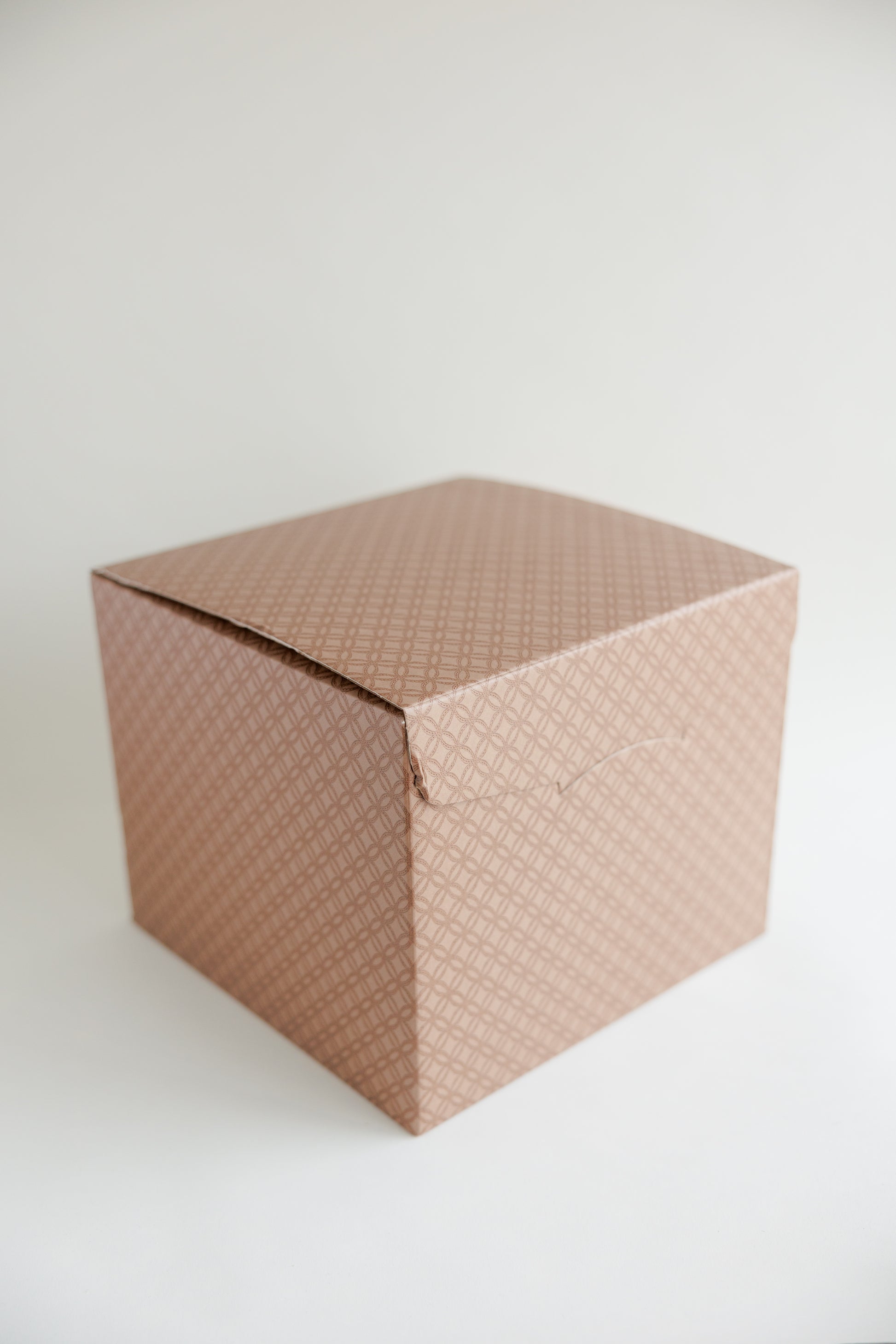 brown cubed gift boxes with lids